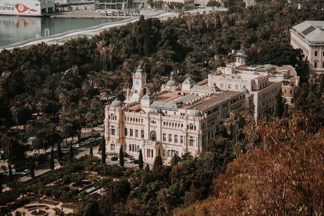 Wedding in Malaga.  Ariel view of Malaga city town hall and nearby buildings with glimpse of Malaga port in the background