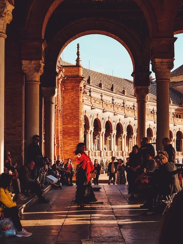 Flamenco dancer in motion, Plaza de Seville, Southern Spain.